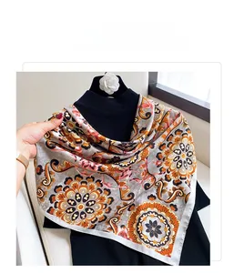 Detailed macro view of vintage mandala pattern and silk texture on the printed shawl