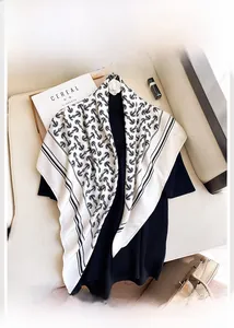 Detail of 90x90cm white silk-like scarf with anchor patterns and black and white stripes
