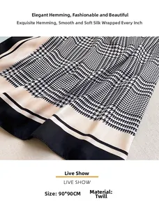 Detailed view of 90x90cm houndstooth twill scarf showing stitching and fabric texture