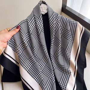 Elegant black and white houndstooth silk scarf with satin finish and wide black border