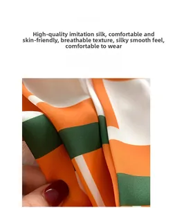 Gros plan détaillé sur le tissu en soie synthétique lisse aux motifs géométriques