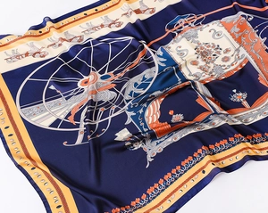 Detailed shot of vintage carriage pattern silk scarf with baroque floral and gold motifs