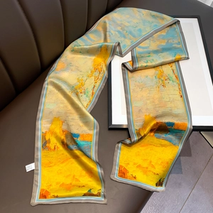 Detail showing colorful abstract oil painting pattern on smooth silk scarf texture