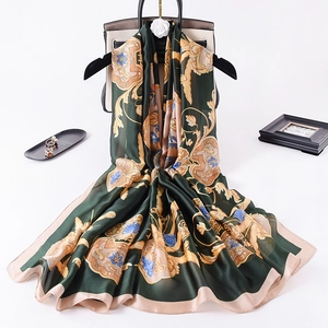 Elegant emerald green silk scarf with baroque floral pattern and golden ornaments for women