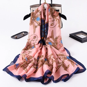 Pink floral print silk scarf with vintage scroll patterns and navy blue borders