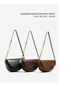 Detailed comparison of saddle bags in black, dark brown and tan with gold chain straps
