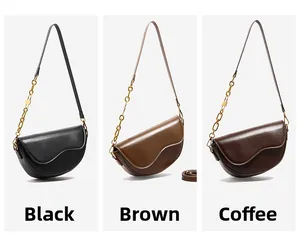 Three half-moon saddle bags in black, brown, and coffee with metallic chain straps