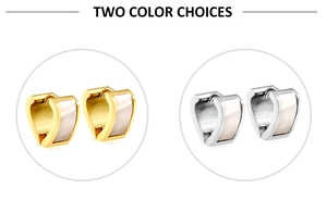 Détail des boucles d'oreilles cœur en nacre avec finitions dorée et argentée