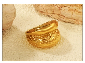 Detail of 18K gold-plated chunky ring featuring smooth polish and hammered texture surface