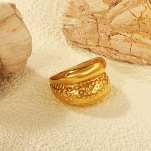 Minimalist 18K gold plated stainless steel ring with polished finish and honeycomb texture