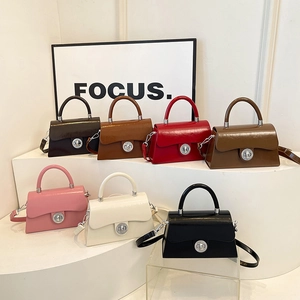 Sacs à bandoulière minimalistes avec fermoirs rotatifs en sept couleurs éclatantes