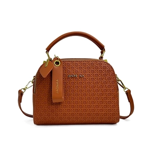 Chic woven caramel brown crossbody bag with rounded handle and detachable strap