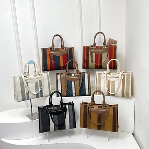 Striped canvas tote bags in seven color combinations with large capacity design