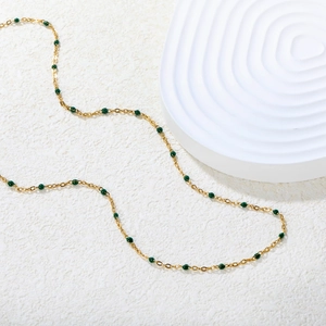 18K gold plated stainless steel necklace featuring small green round beads on a fine chain
