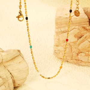 Colorful drip oil bead necklace in gold stainless steel with vibrant enamel accents