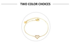 Detail of gold hollow heart pendant with pave stones on stainless steel chain