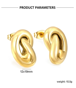 Detail view of twisted gold stud earrings with heart accent, 12x19mm dimensions