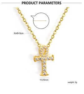 Detailoverzicht van gouden Ankh kruis hanger met zirkonia en sieraad afmetingen