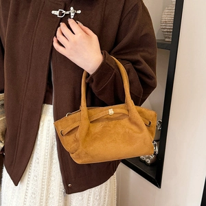 Sac fourre-tout vintage en daim marron avec cordon et détails dorés élégants