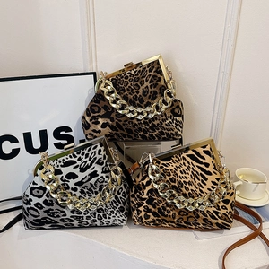 Three leopard print shell bags with gold chain straps and retro frames for women