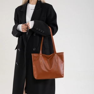 Brown crocodile embossed leather tote bag with long straps for chic office shoulder wear