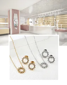 Detail von Sonnenblumen-Zirkonia-Schmuckset mit Silber- und Goldbeschichtung und Kristallen