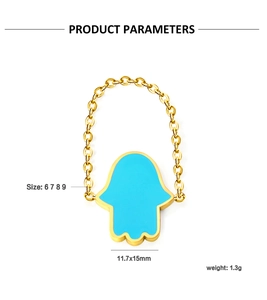 Detail view of golden Hamsa Hand chain ring with blue inlay and size specifications