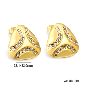 Macro view of geometric gold triangle earrings with crystals and size markings