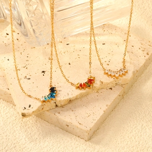 Elegant gold necklace with marquise-cut zircon petals in blue, rainbow, and white colors