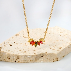 Elegant 18K gold-plated rhombus necklace with colorful marquise zircons on travertine stone