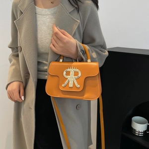 Fashionable bright orange leather handbag with gold R-letter lock and shoulder strap