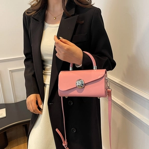 Fashionable pale pink structured box bag with silver hardware for women in daily use