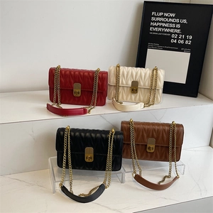 Quilted crossbody bags with V-stitch and gold chain in red, white, black and brown