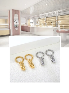 Artistic gold and silver female torso earrings with polished mirror finish details