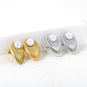 French vintage shell-textured 18K gold and silver earrings with elegant white pearl details