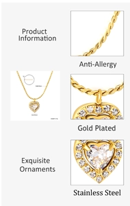 Detail of gold plated stainless steel heart pendant necklace with clear zircon inlay