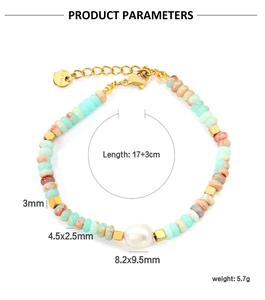 Detail of colorful beads and white pearl bracelet with gold stainless steel lobster clasp