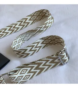 Adjustable wide replacement shoulder strap with brown and white geometric weave pattern