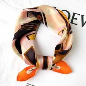 Elegant multi-color silk square scarf with geometric floral print on a white background