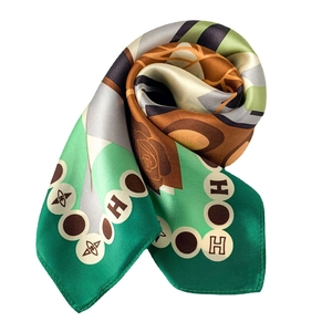 Elegant silk square scarf featuring dark green geometric patterns and H logo accents
