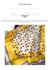 Detail showing the silk-like glossy texture and straw hat print of a yellow square scarf