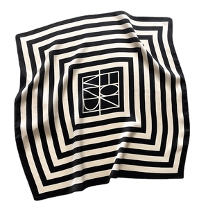 Classic black and white striped silk square scarf featuring abstract geometric patterns