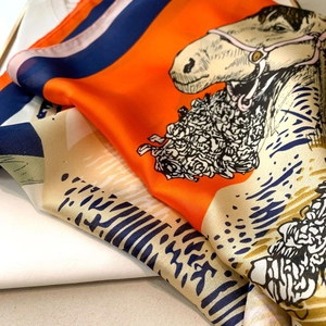 Silk-textured square scarf with equestrian horse prints and elegant orange color block