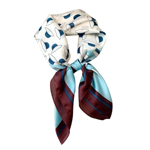 Silk square scarf with floral prints and blue hat patterns in ivory and light blue