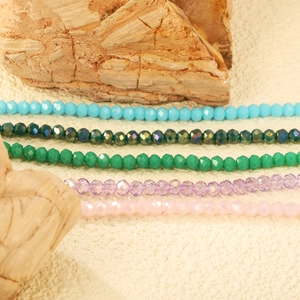 Bracelets en perles de cristal facettées aux couleurs pastel et acier inoxydable