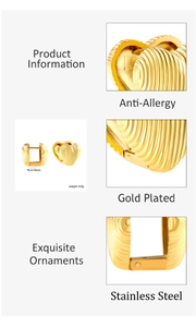 Macro detail of ribbed heart hoop earrings in gold-plated stainless steel material