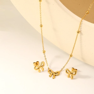 Parure minimaliste nœud doré avec collier pendentif et boucles d'oreilles assorties