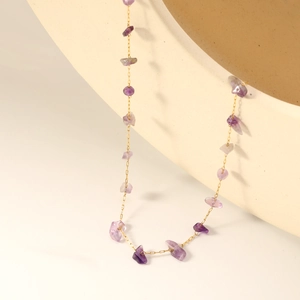 Handmade necklace with purple gemstone chips and minimalist golden stainless steel chain