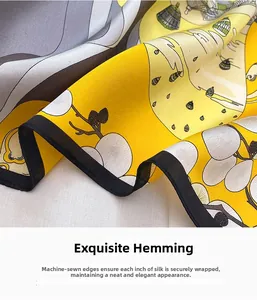 Detailed shot of high-density machine-hemmed edges on a silk-like satin floral scarf