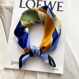 Elegant silk square scarf with blue wavy patterns and geometric abstract art prints